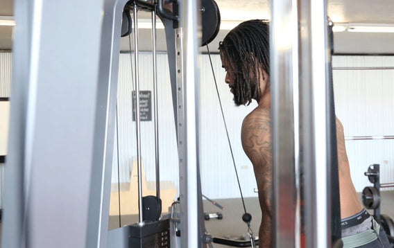 Man working out at exercise machine