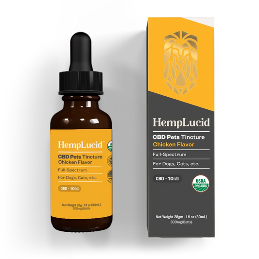 HempLucid CBD Full-Spectrum Pet Tincture in chicken flavor, 10mg CBD per serving, 300mg total, displayed alongside its white packaging box highlighting USDA Organic certification.