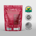 The back panel of the HempLucid Stress Gummies 30CT bag standing on a surface next to three icons: Vegan, GMP Quality, and Made in the USA