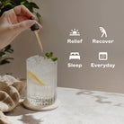Relief. Recover. Sleep. Everyday. A hasnd holding an eyedropper as it drips into a refreshing drink on a counter.